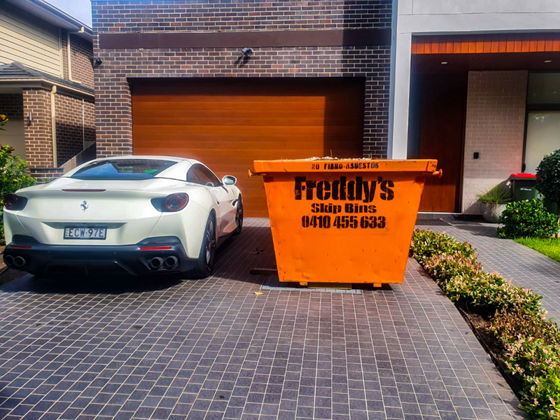 Narrow driveway delivery next to Ferrari